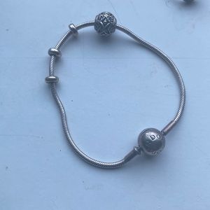 Pandora essence bracelet with charms